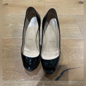 Christian Louboutin Very Privé
120 mm Platform pumps Patent calf leather Blacks